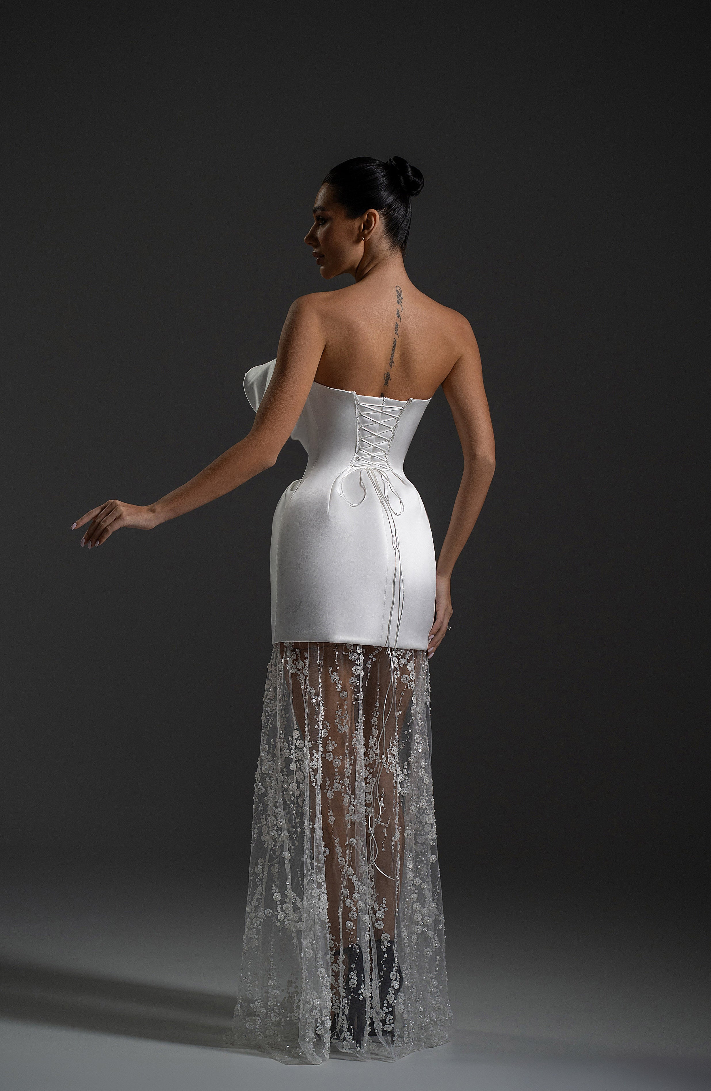 Side back view of Serene white maxi dress by Lafatale Atelier