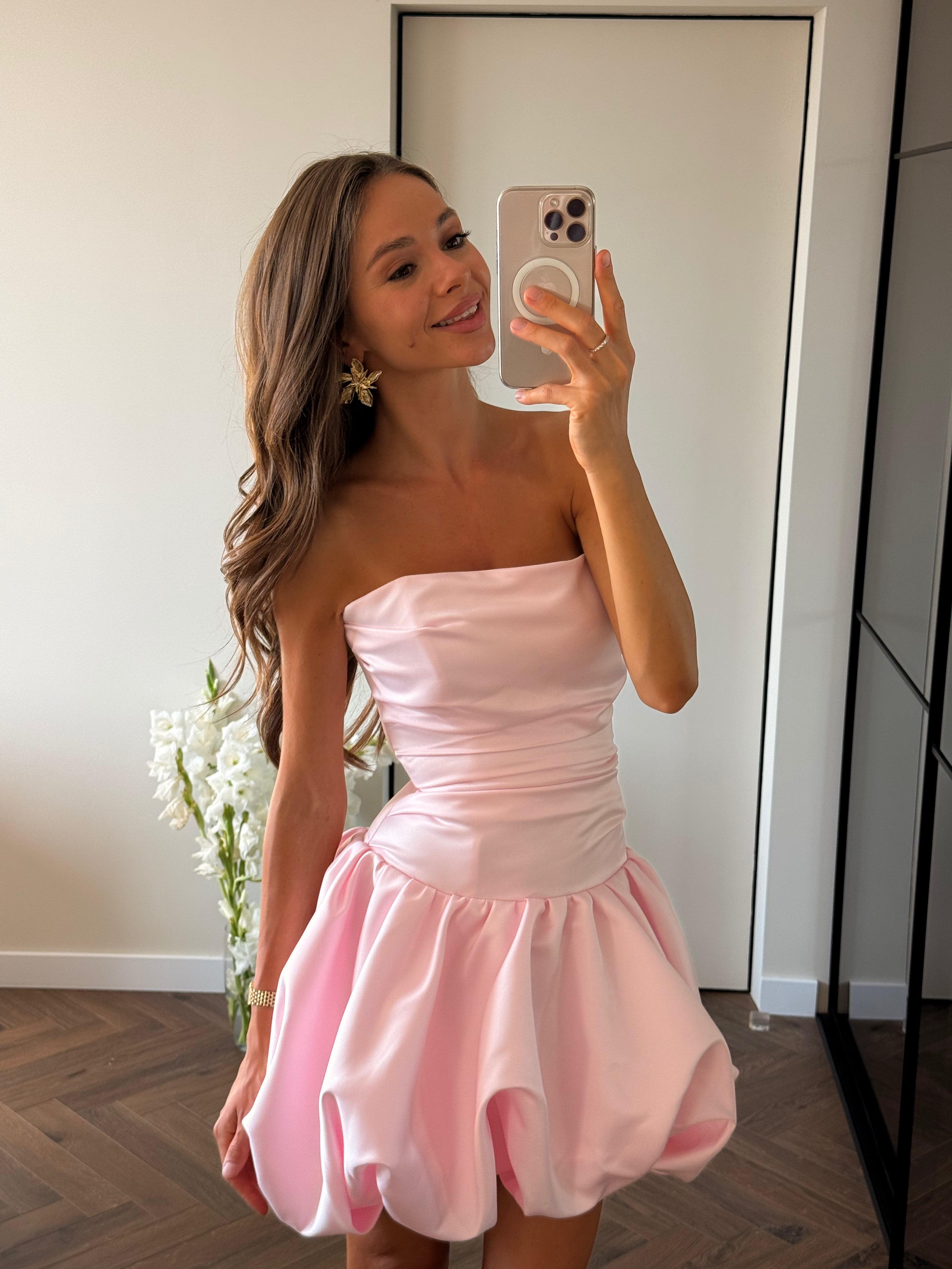Close-up of Flora Dress in pink color with strapless bodice