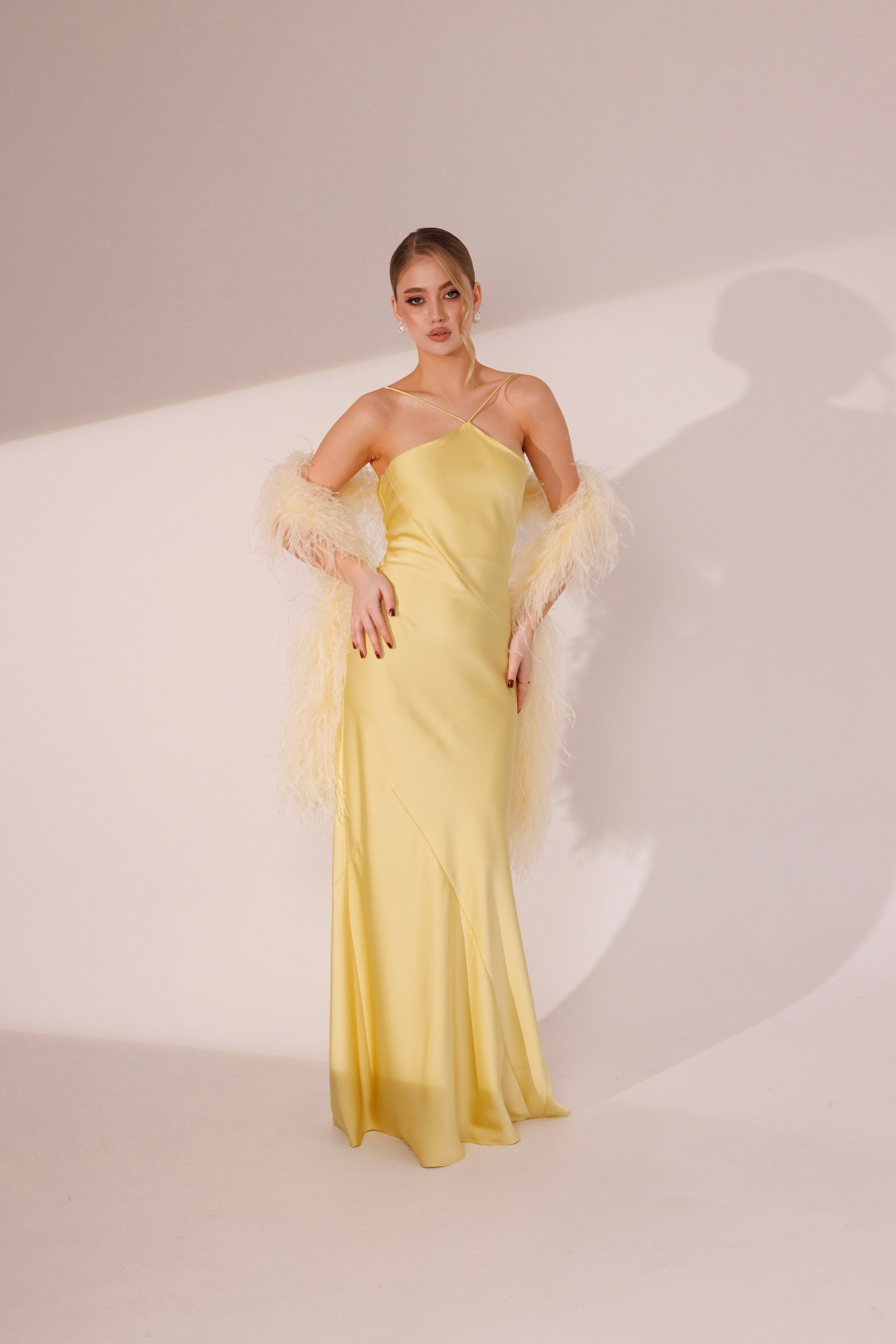 Elara Dress in yellow color with open back and elegant maxi silhouette by Lafatale Atelier