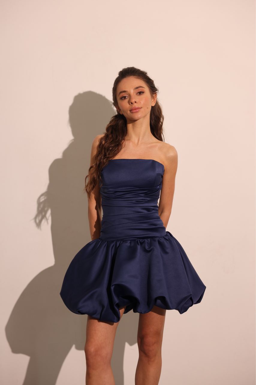 Full-length view of navy strapless mini dress by Lafatale Atelier