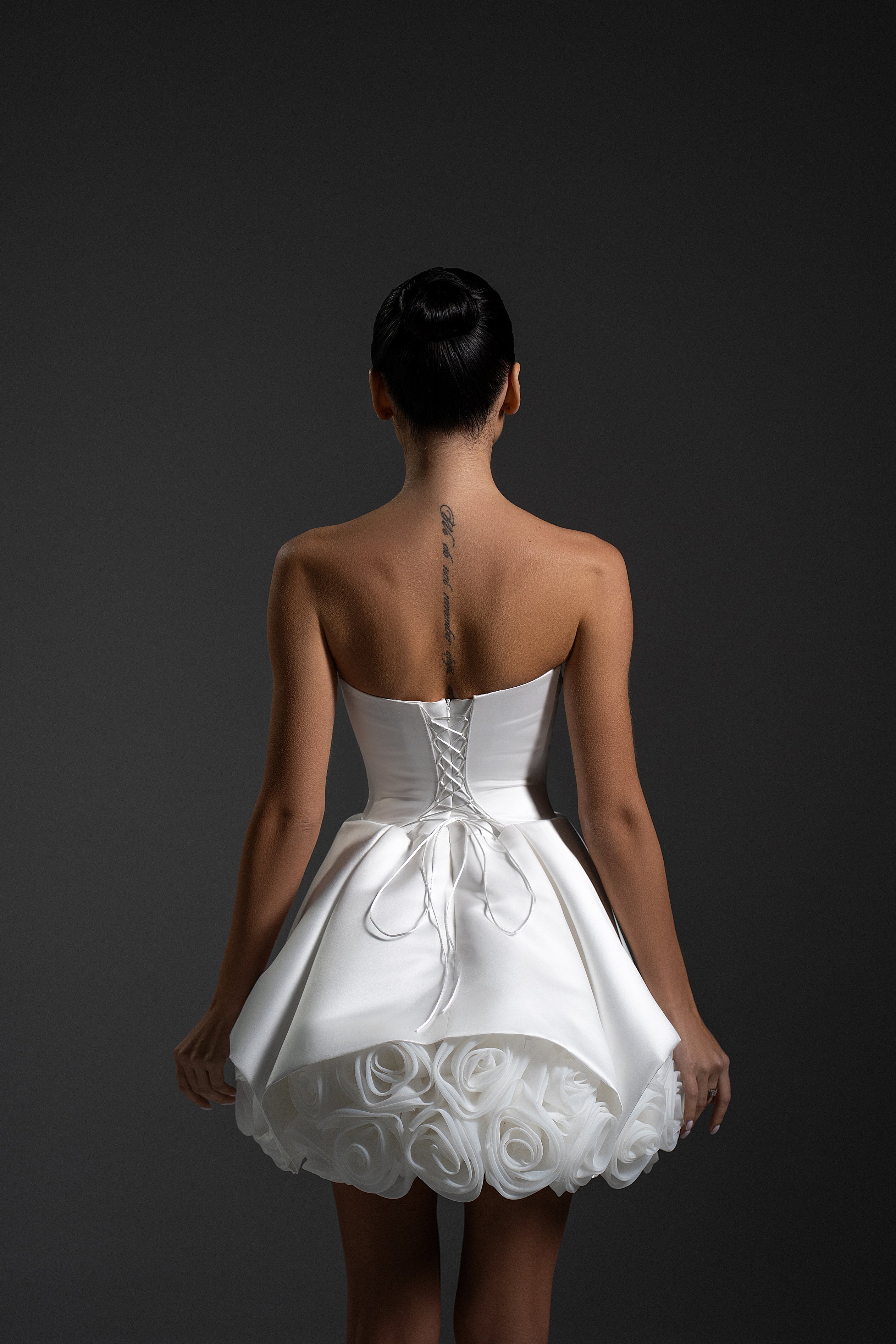 Back view of La Rose white mini dress with strapless corset