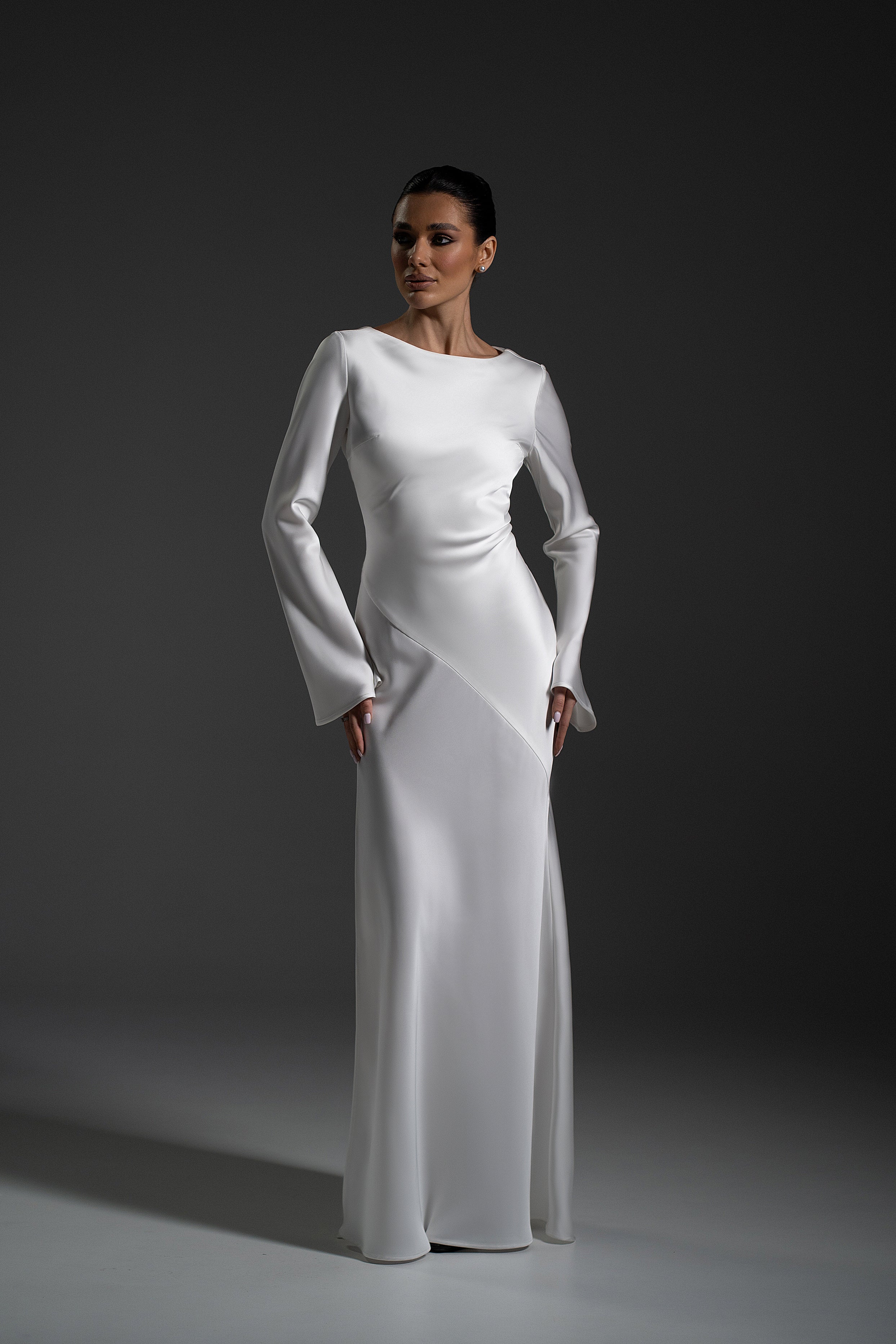 Naomi Dress in white color with long sleeves and elegant maxi silhouette by Lafatale Atelier