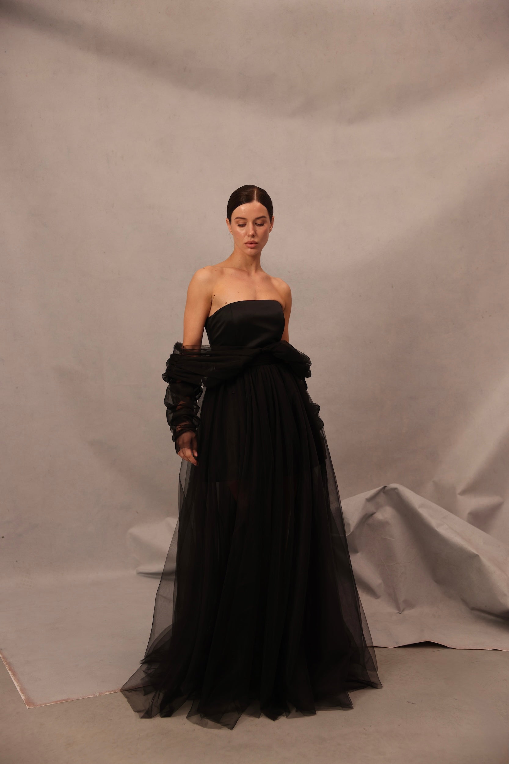 Voile Sateen Dress in black color with strapless bodice and sheer tulle maxi skirt by Lafatale Atelier