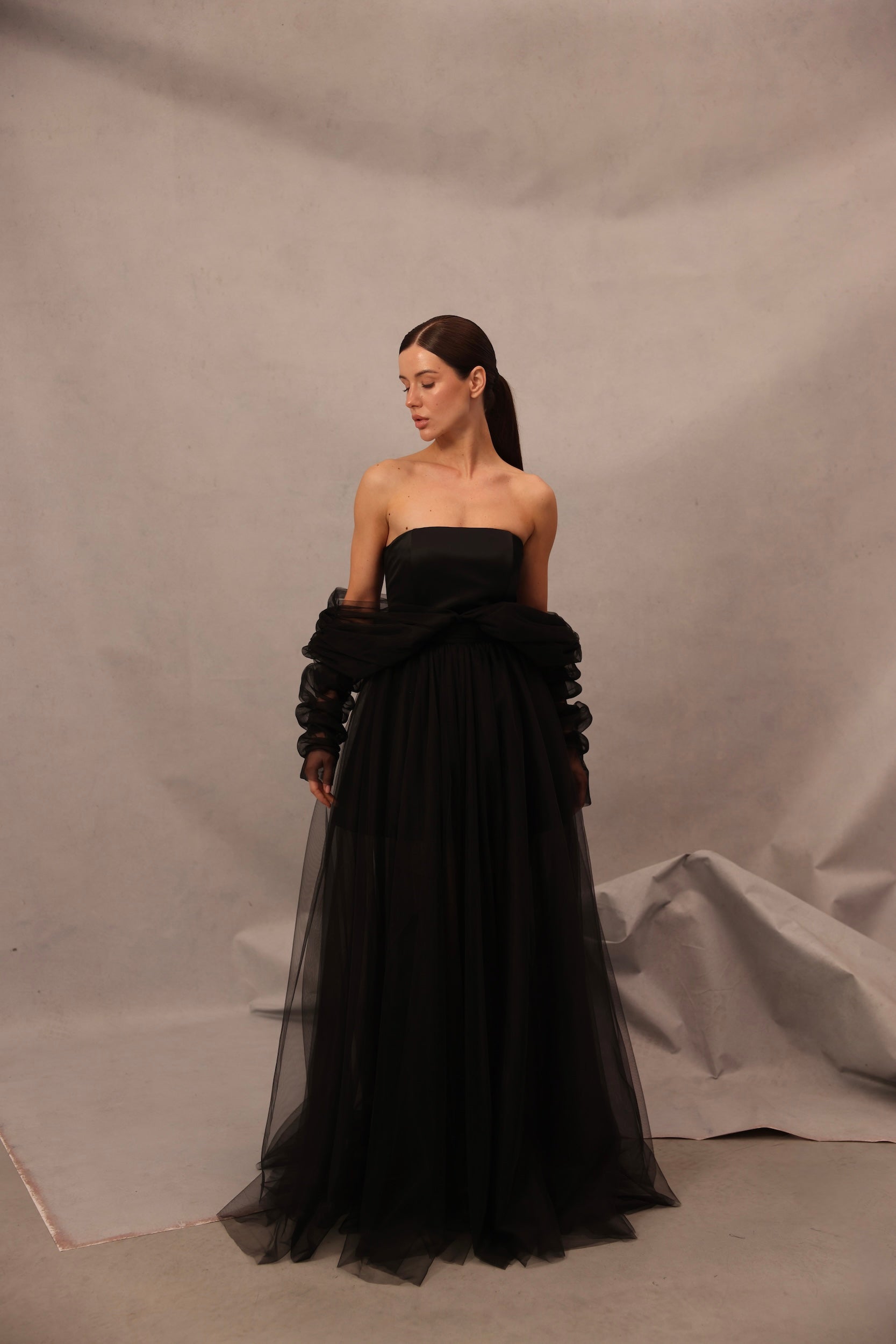 Full-length view of Voile Sateen Dress in black color by Lafatale Atelier