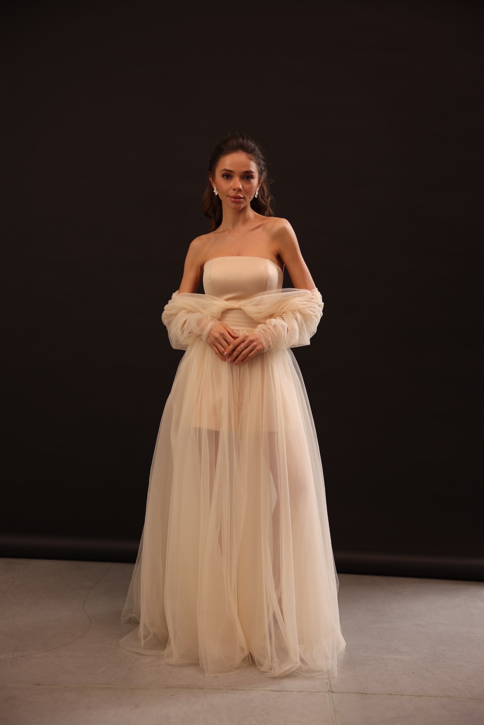 Model wearing Voile Sateen Dress in beige color for special occasions