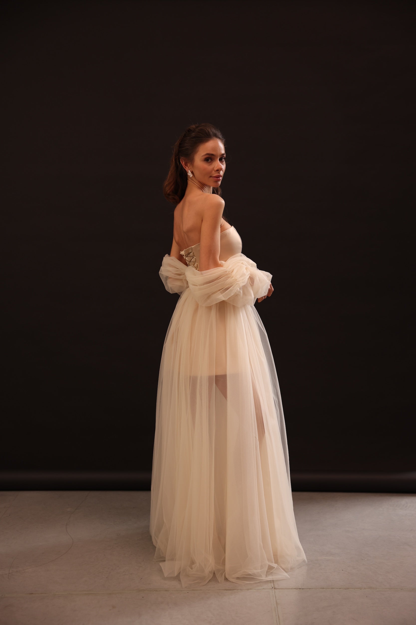 Full-length view of Voile Sateen Dress in beige color by Lafatale Atelier