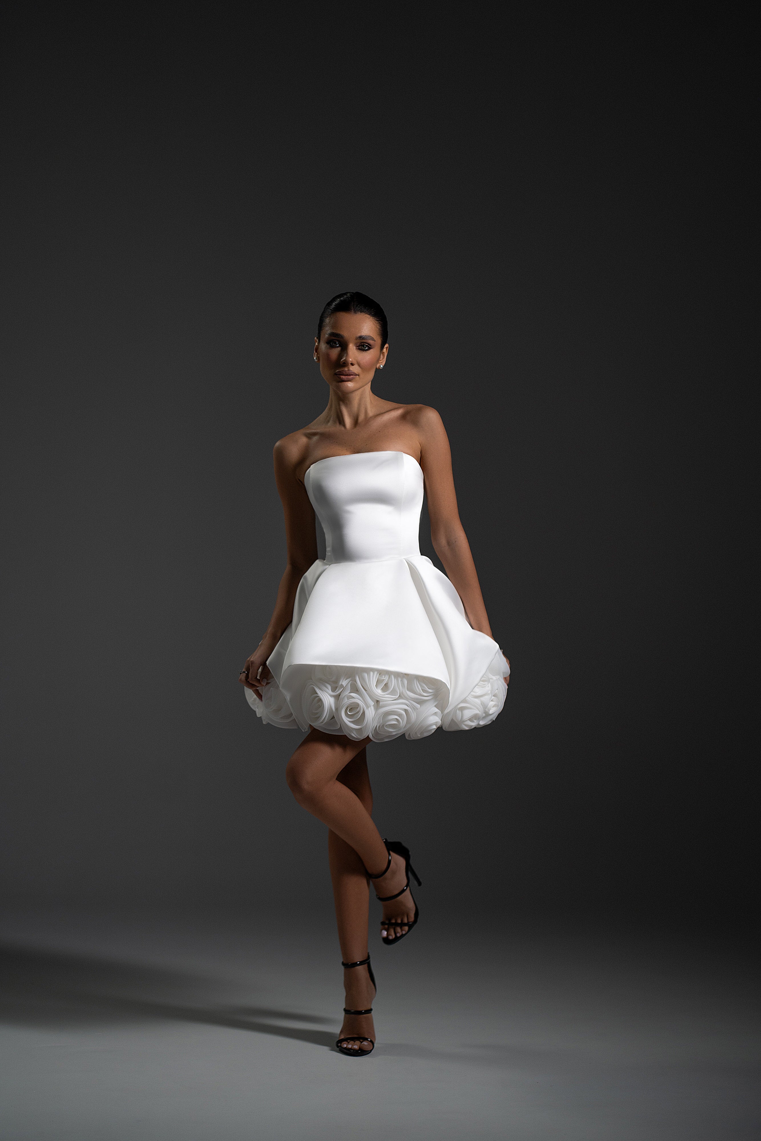 Full-length view of La Rose white mini dress for cocktail events