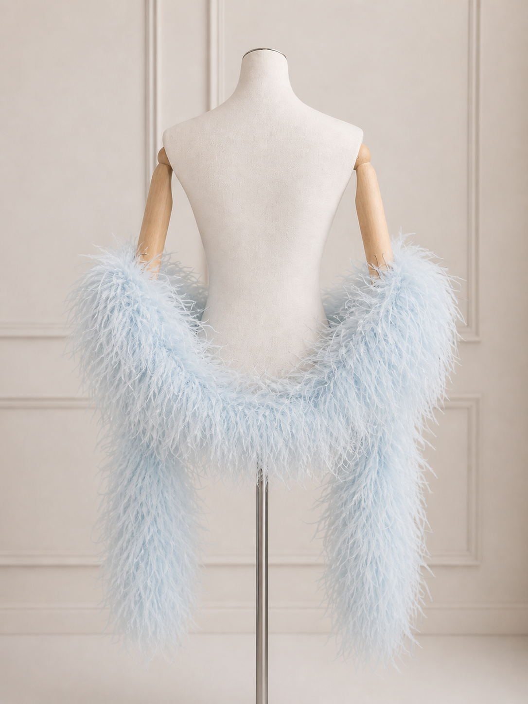 Natural Ostrich Feather Boa in blue color on mannequin by Lafatale Atelier