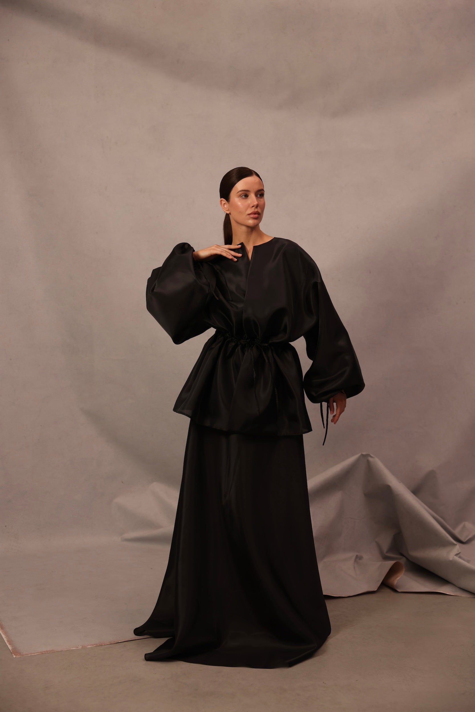 Set Comte in black color with sheer organza pants and voluminous wrap top by Lafatale Atelier